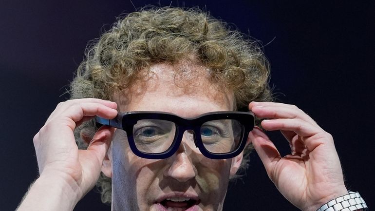 Mark Zuckerberg wears a pair of Orion AR glasses during...