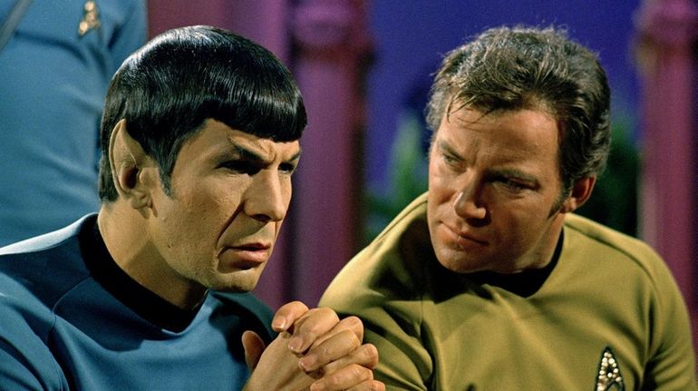 Leonard Nimoy, left, played Spock and William Shatner was Capt....