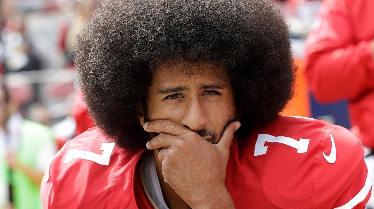 Colin Kaepernick agrees to settle collusion case against the NFL