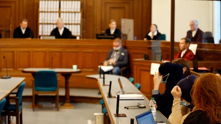 A general view shows the courtroom at the beginning of...