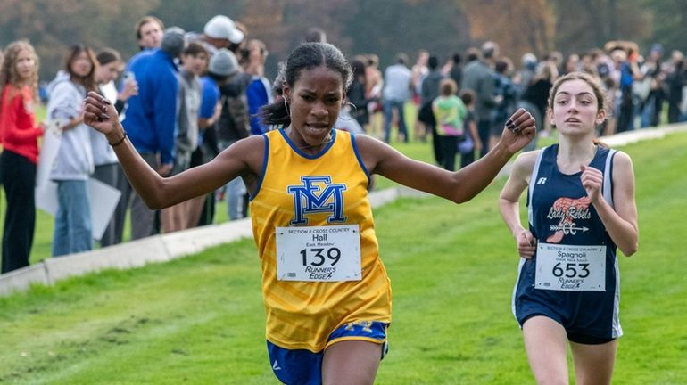 Zaria Hall of East Meadow, left and Isabella Spagnoli prepare...