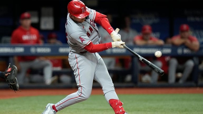 Los Angeles Angels' Brandon Drury singles off Tampa Bay Rays...