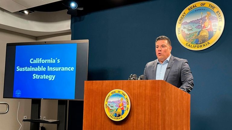 California Insurance Commissioner Ricardo Lara speaks during a news conference...