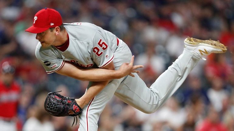 Jared Hughes #25 of the Philadelphia Phillies pitches against the...