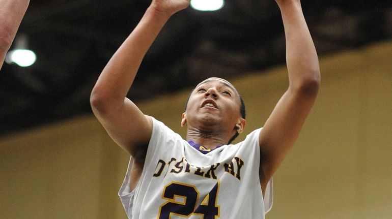 Khalil Williams #24 of Oyster Bay drives to the net...