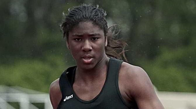 St. Anthony's Halle Hazzard wins the girls 100-meter dash during...