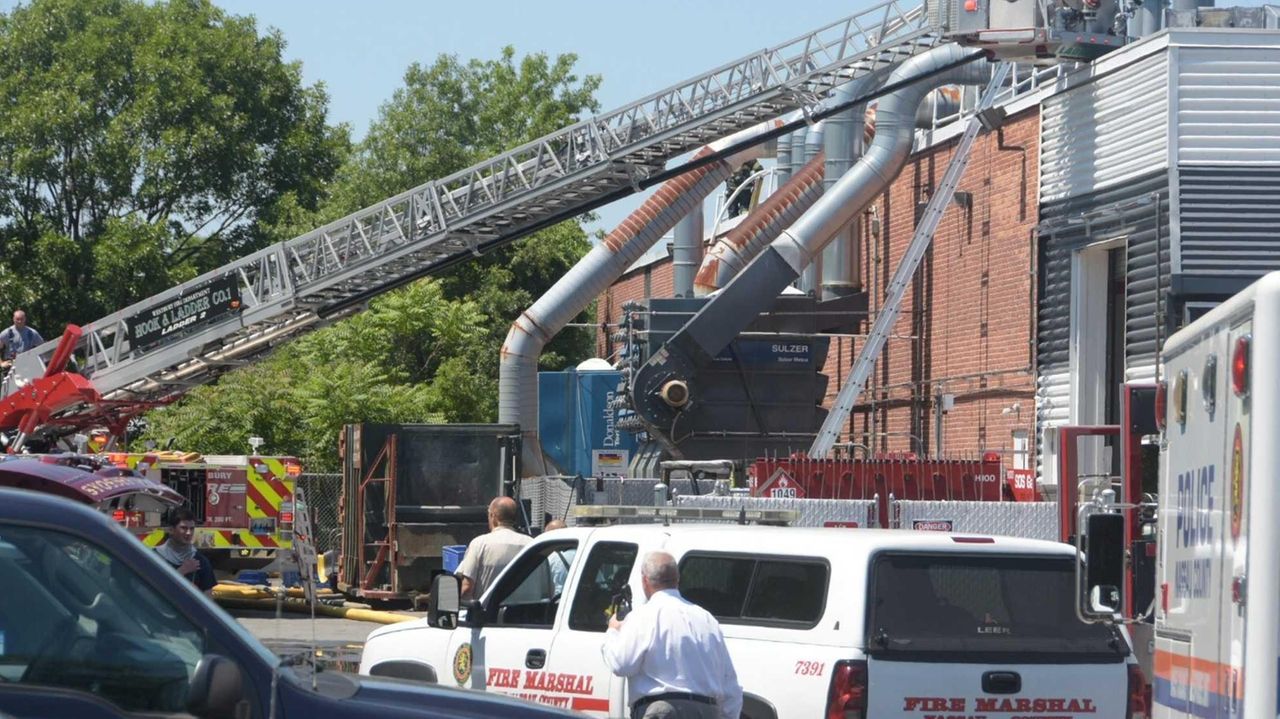 New Cassel commercial blaze leaves worker critical, firefighter in