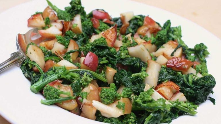 Apples balance the bite of broccoli rabe in this dish....