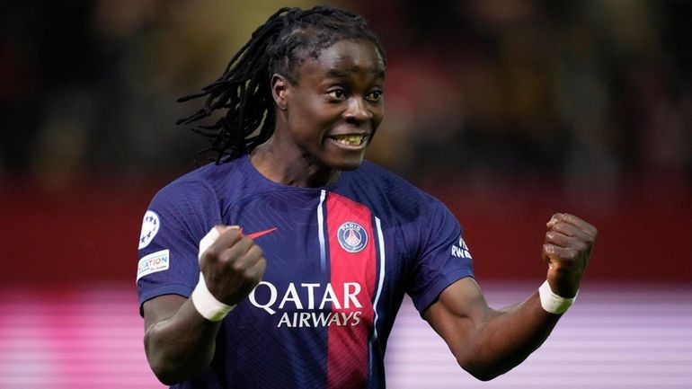 PSG's Tabitha Chawinga celebrates after scoring during the women's Champions...