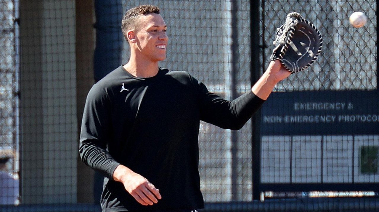 Aaron Judge fields throws at first base at Yankees spring training