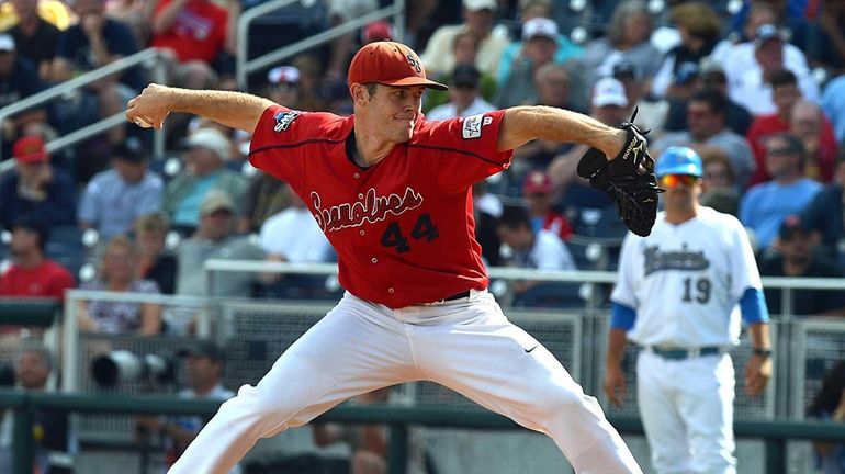 Stony Brook starting pitcher Tyler Johnson delivers in the third...