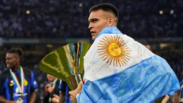 Inter's Lautaro Martinez celebrates their victory of the "scudetto" after...