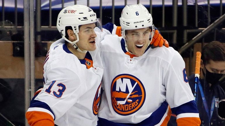 The Islanders' Mathew Barzal, left, celebrates his first-period goal against...
