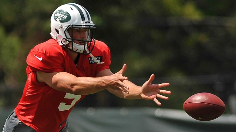 Christian Hackenberg #5, New York Jets rookie quarterback, pitches the...