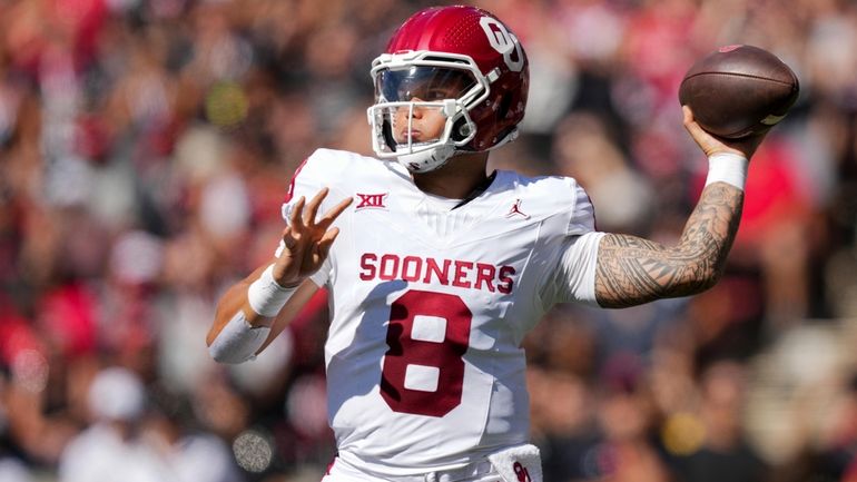 Oklahoma quarterback Dillon Gabriel throws a pass during the first...