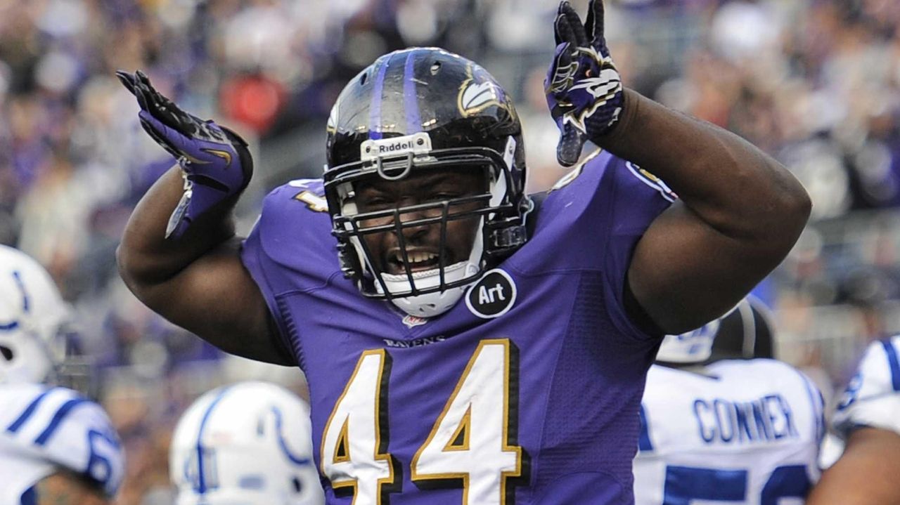 Baltimore Ravens Ray Lewis reacts with Joe Flacco after the game