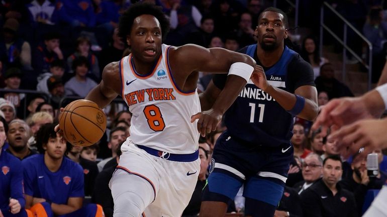 OG Anunoby #8 of the New York Knicks drives against...