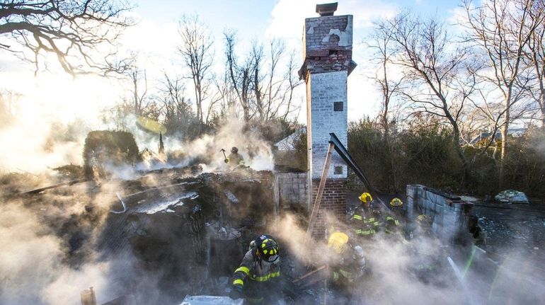 An unoccupied home on Hyatt Road in Southold burned to...