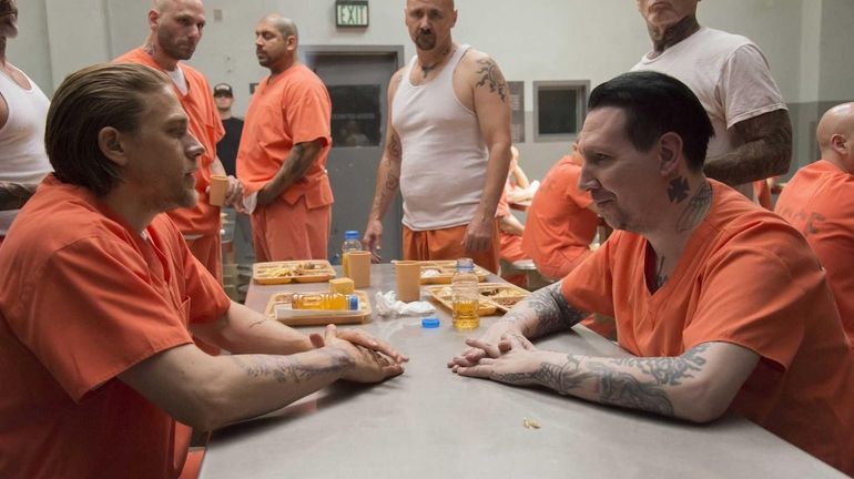 From left, Charlie Hunnam as Jax Teller and Marilyn Manson...