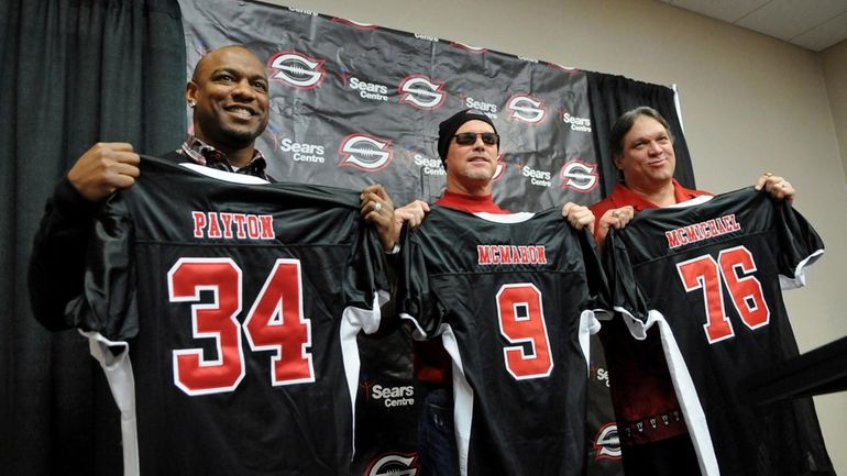 Jarrett Payton, left, son of Chicago Bears Hall of Fame...