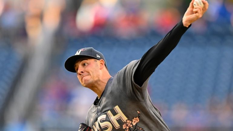 Washington Nationals pitcher Patrick Corbin throws during the first inning...