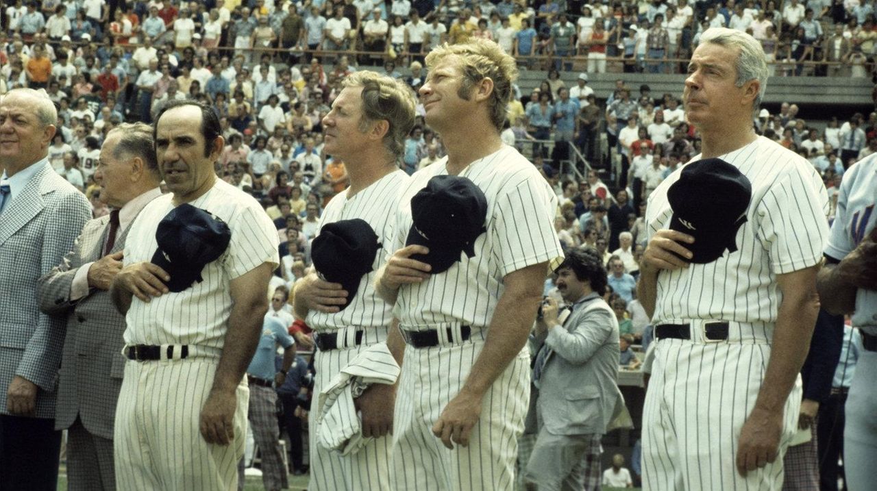 Joe DiMaggio is honored at Yankee Stadium on the last day of the News  Photo - Getty Images