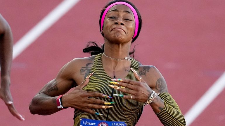 Sha'Carri Richardson celebrates her win in the wins women's 100-meter...