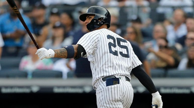 Gleyber Torres of the New York Yankees watches his two-run...