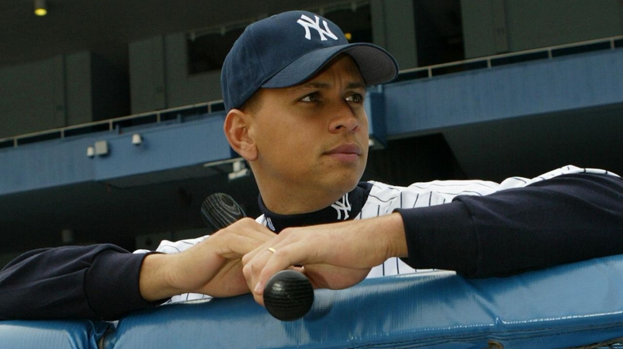 Reigning American League Most Valuable Player Alex Rodriguez tips his hat  to the media covering his Feb. 17, 2004 press conference at New York's  Yankee Stadium after he was introduced as the