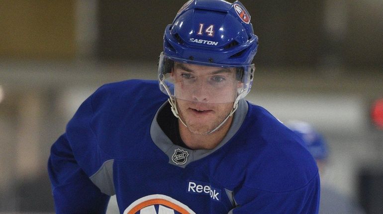 New York Islanders' Thomas Hickey skates at training camp on...