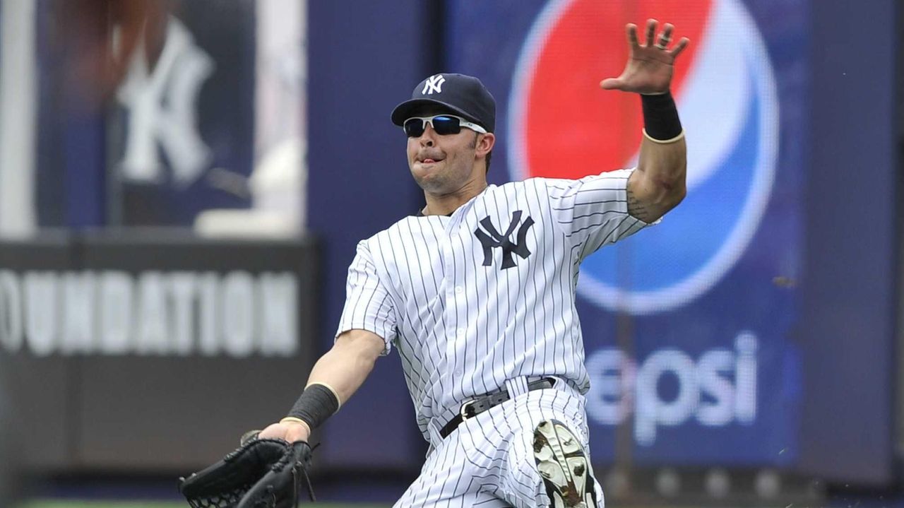 Joe Girardi happy with playing Nick Swisher at first base - Newsday