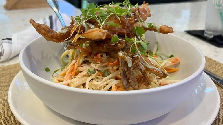 Crispy local soft shell crab over kani salad at the...