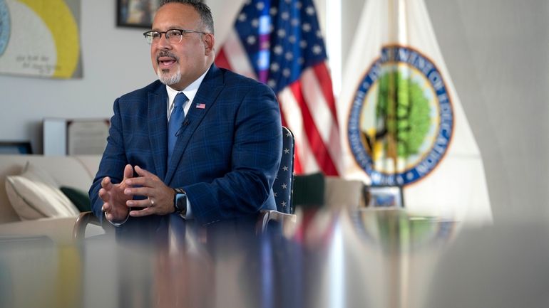 Education Secretary Miguel Cardona speaks during an interview with The...