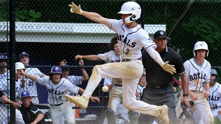 Port Jefferson's Frank Andriani scores the game winning run in...