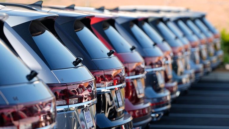 A row of unsold 2024 Atlas utility vehicles is shown...