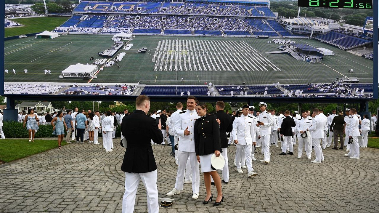 Defense secretary tells US Naval Academy graduates they will lead ...