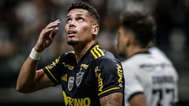 Paulinho of Brazil´s Atletico Mineiro gives thanks after scoring during...