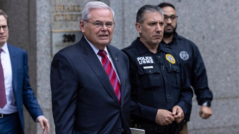 Sen. Bob Menendez, D-N.J., leaves the Manhattan federal court, after...