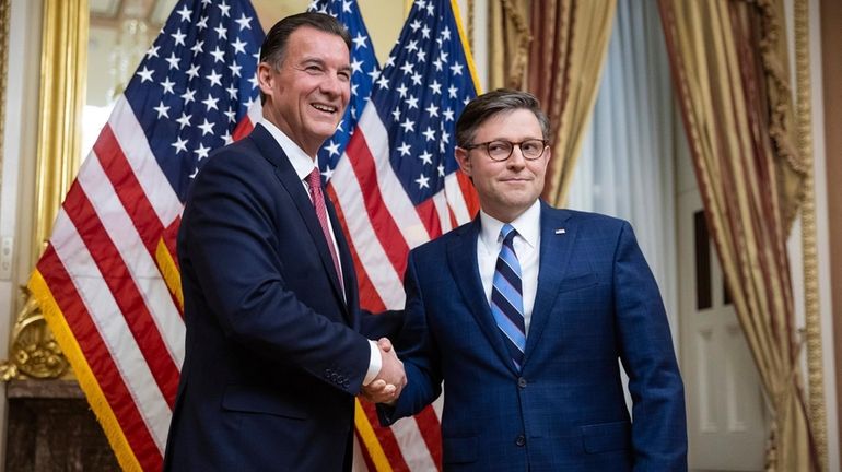 Rep. Tom Suozzi (D-N.Y.) and House Speaker Mike Johnson (R-La.)...