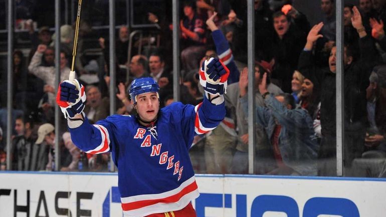 Rangers center Brandon Dubinsky celebrates his second goal of the...