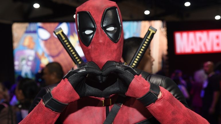 Jesus Rodriquez dressed as Deadpool poses at Comic-Con International on...