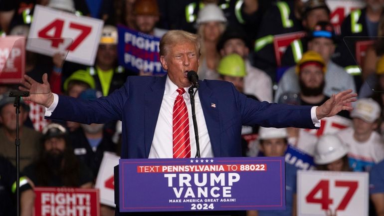 Republican presidential nominee former President Donald Trump speaks during a...