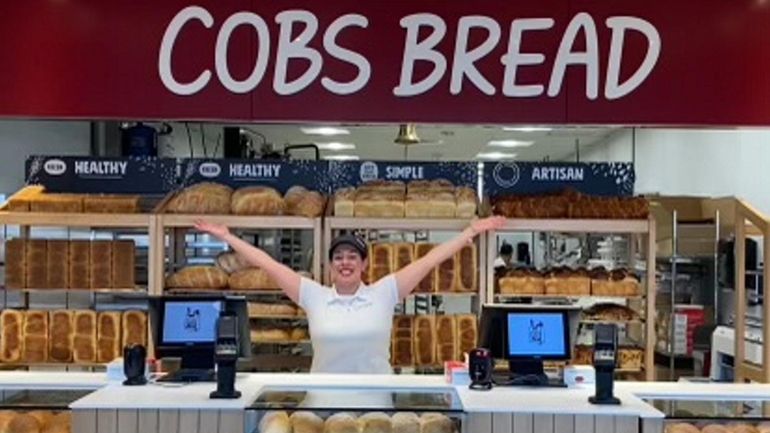 Roseann Rosario, Cobs Bread’s district manager, is shown in the Oceanside...