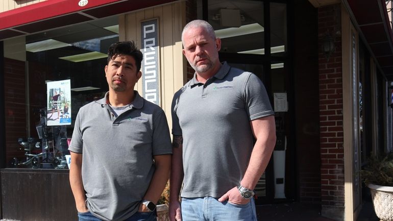 Richard Shiu, left, and Anthony Martincic, co-owners of Franwin Pharmacy Mineola...