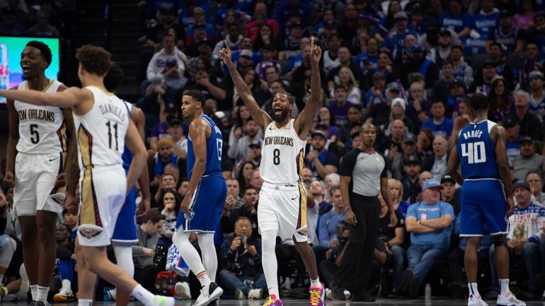 New Orleans Pelicans forward Naji Marshall (8) walks off the...