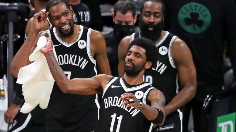 Boston - May 30: The Nets Kyrie Irving waves a...