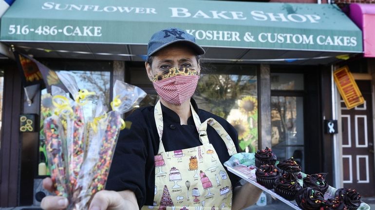 Elana Schondorf, owner of The Sunflower Bakeshop in West Hempstead, with...