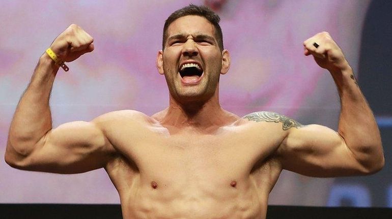 Chris Weidman reacts during UFC 205 weigh-ins at Madison Square...