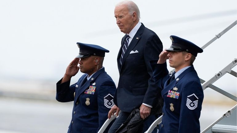 President Joe Biden arrives at John F. Kennedy International Airport...