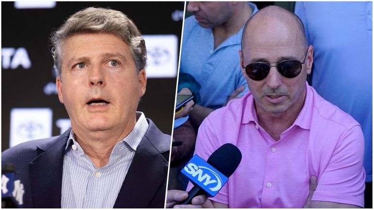 Yankees owner Hal Steinbrenner and GM Brian Cashman.